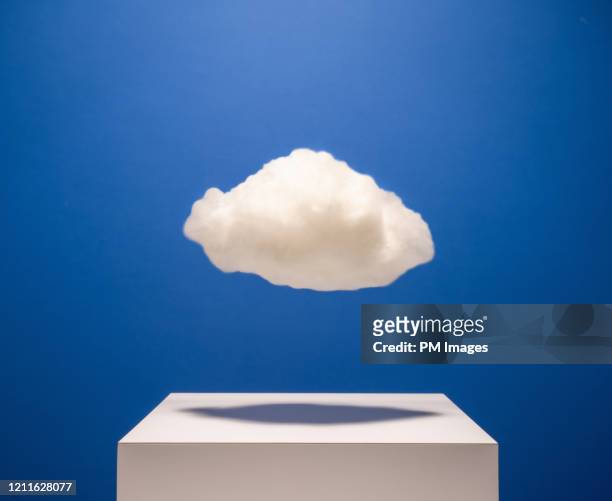 cloud over pedestal - cloud computing stock-fotos und bilder