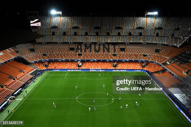 In this handout image provided by UEFA, General view inside the empty stadium during the UEFA Champions League round of 16 second leg match between...