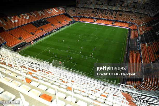 In this handout image provided by UEFA, General view inside the empty stadium during the UEFA Champions League round of 16 second leg match between...
