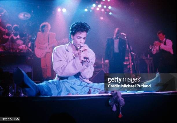 Prince performs on stage on the Hit N Run-Parade Tour, Wembley Arena, London, August 1986.