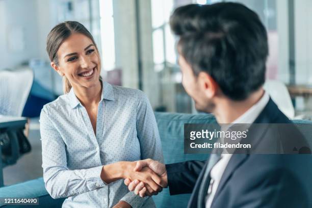 business handshake - happy candidate stock pictures, royalty-free photos & images