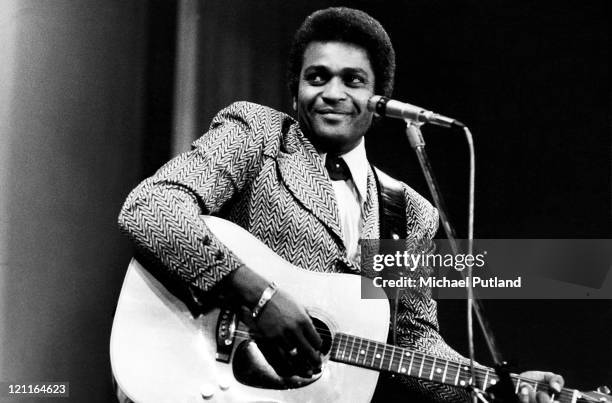 Charley Pride performs on a TV show, London, February 1975.