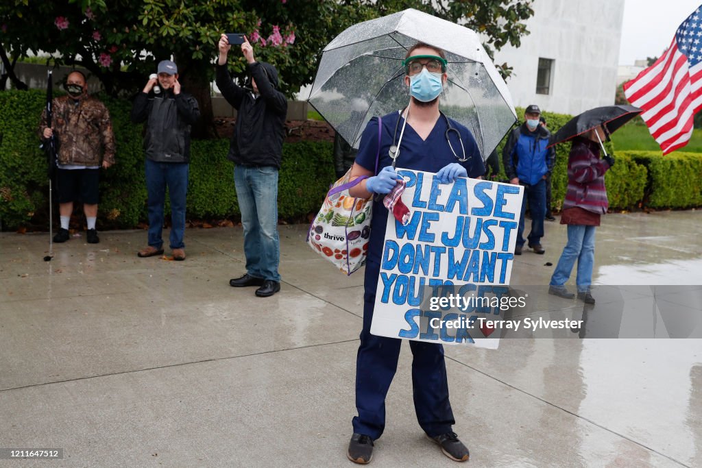 Protestors Rally At Oregon State Capitol Against Stay-At-Home Order