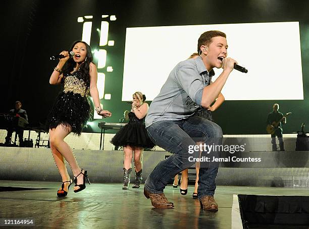 American Idol Season 10 winner Scotty McCreery performs with American Idol Season 10 contestant Thia Megia during the 2011 "American Idols Live!"...