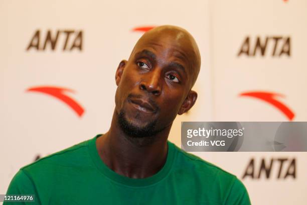 Kevin Garnett of the Boston Celtics talks to the media after arriving at Baiyun Airport on August 14, 2011 in Guangzhou, Guangdong Province of China.