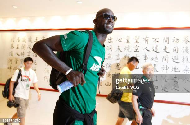 Kevin Garnett of the Boston Celtics talks to the media after arriving at Baiyun Airport on August 14, 2011 in Guangzhou, Guangdong Province of China.