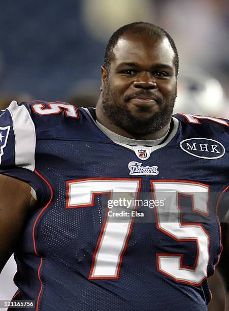 Vince Wilfork of the New England Patriots looks on from the bench during the game against the Jacksonville Jaguars on August 11, 2011 at Gillette...