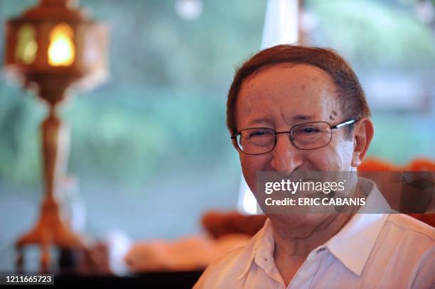 Algeria's Berber singer Idir poses on June 18, 2009 in Toulouse, southwestern France, during the 15th edition of the Rio Loco Music Festival. Taking...