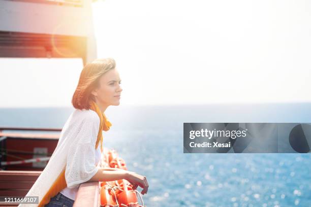 young woman enjoying freedom - end of summer stock pictures, royalty-free photos & images