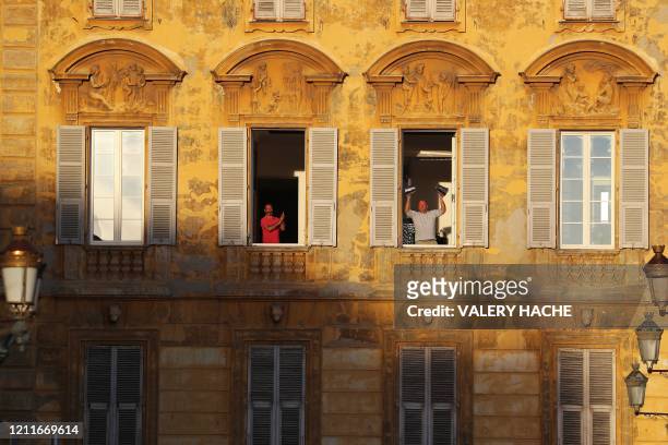 Two men applaud every evening at 20:00 from windows of the house of Henri Matisse, where the French artist lived from 1921 to 1938 in the French...