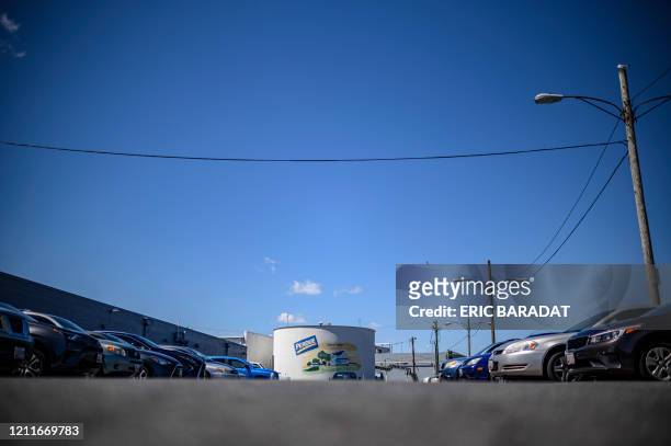 Employee cars are seen on the parking lot outside the Perdue Farms Chicken and poultry processing factory on May 2, 2020 in Salisbury, Maryland. -...