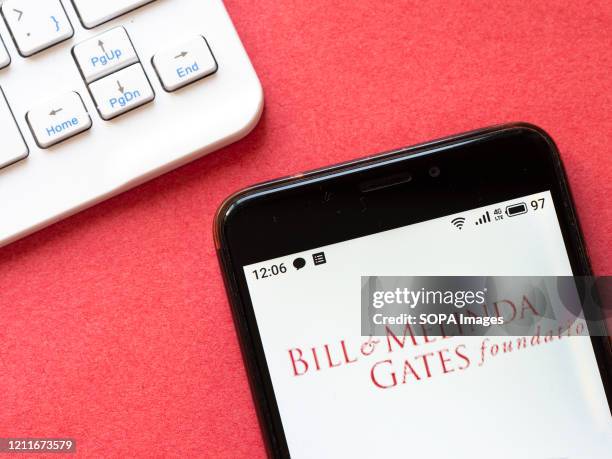 In this photo illustration a Bill & Melinda Gates Foundation logo seen displayed on a smartphone.