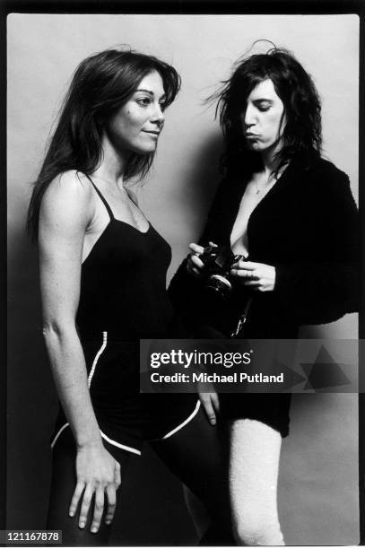 Patti Smith taking a photo of photographer Lynn Goldsmith, New York, 1978.