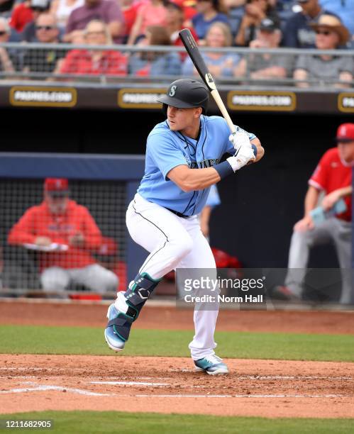 Jarred Kelenic of the Seattle Mariners gets ready in the batters box against the Los Angeles Angels during a spring training game at Peoria Stadium...