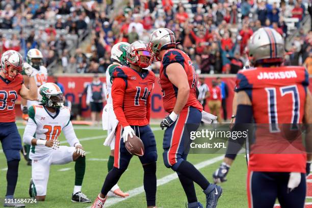 Cam Phillips and Ryan Anderson of the Houston Roughnecks celebrate after a touchdown during the XFL game against the Seattle Dragons at TDECU Stadium...