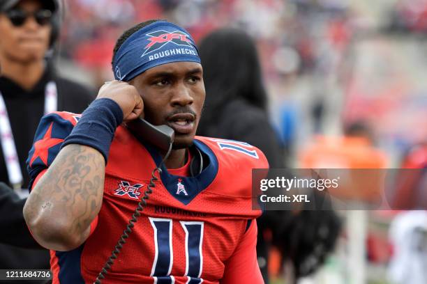 Walker of the Houston Roughnecks talks on the sideline phone during the XFL game against the Seattle Dragons at TDECU Stadium on March 7, 2020 in...