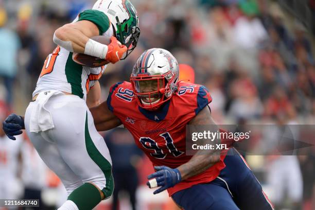 Caushaud Lyons of the Houston Roughnecks tries to make a tackle during the XFL game against the Seattle Dragons at TDECU Stadium on March 7, 2020 in...