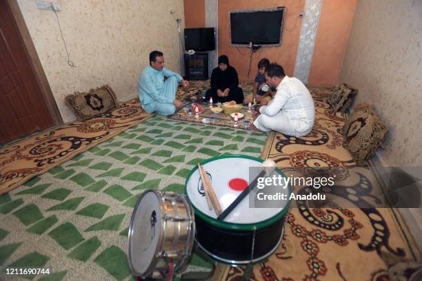 Muhammed Muhsin and Raid Kaabi are seen before waking public up for sahur meal by playing drums amid coronavirus pandemic, in Baghdad, Iraq on May 4,...