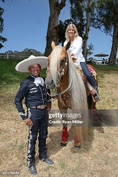 Mexican Charro and Rope Artist Tomas Garcilazo and Jennifer Rogers-Etcheverry pose during the Will Rogers Ranch Foundation's Dog Iron Polo Match &...