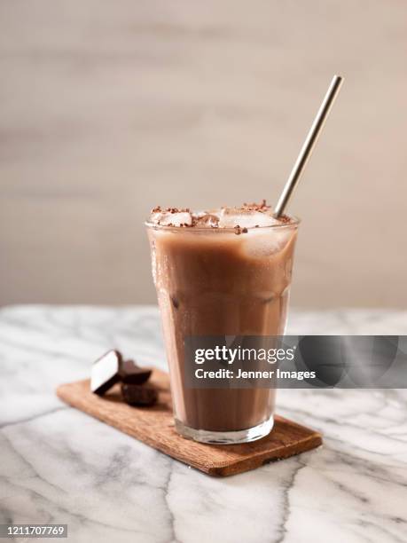 vegan iced chocolate coconut milk and chocolate. - chocolate smoothie stock pictures, royalty-free photos & images