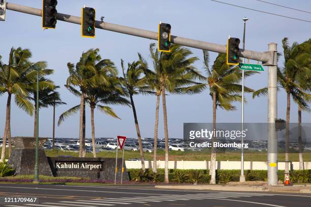 Rental cars sit parked at Kahului Airport in Kahului, Hawaii, U.S., on Friday, April 24, 2020. Tourism makes up one-fifth of Hawaii's economy gross...