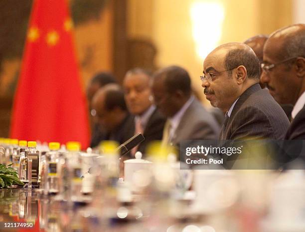 Ethiopian Prime Minister Meles Zenawi looks on during a meeting with Chinese Premier Wen Jiabao at the Great Hall of the People meet on August 15,...