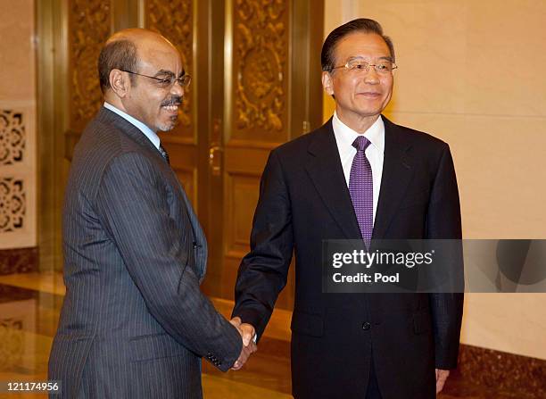 Chinese Premier Wen Jiabao meets with Ethiopian Prime Minister Meles Zenawi at the Great Hall of the People meet on August 15, 2011 in Beijing,...