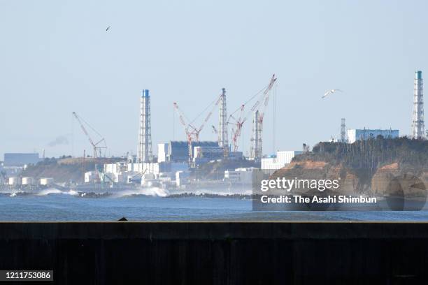 Crippled Fukushima Daiichi Nuclear Power Plant is seen on the 9th anniversary of the Great East Japan Earthquake on March 11, 2020 in Namie,...