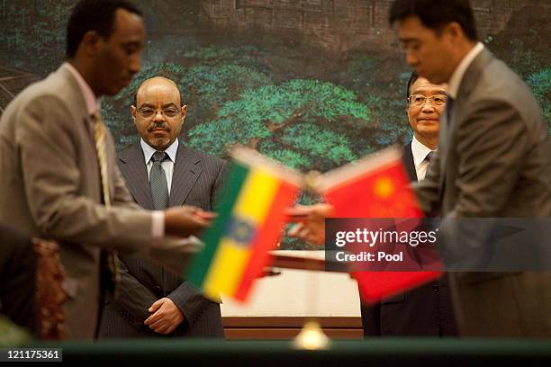 Chinese Premier Wen Jiabao attends a signing ceremony with Ethiopian Prime Minister Meles Zenawi at the Great Hall of the People meet on August 15,...