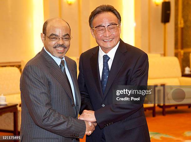 Chinese National Peoples Congress Standing Committee Chairman Wu Bangguo meets with Ethiopian Prime Minister Meles Zenawi at the Great Hall of the...
