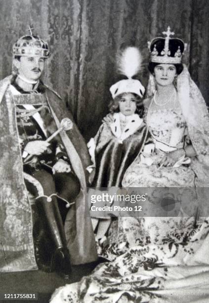 Photographic portrait of Zita of Bourbon-Parma , Emperor Charles I of Austria and their eldest son Crown Prince Otto von Hasburg after the Coronation...