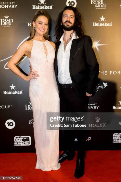 April Rose Pengilly and Alex Laska attends the Glamour On The Grid party on March 11, 2020 in Melbourne, Australia.