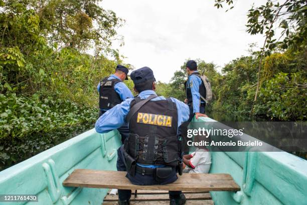 police travelling on a river - decompression sickness stock pictures, royalty-free photos & images