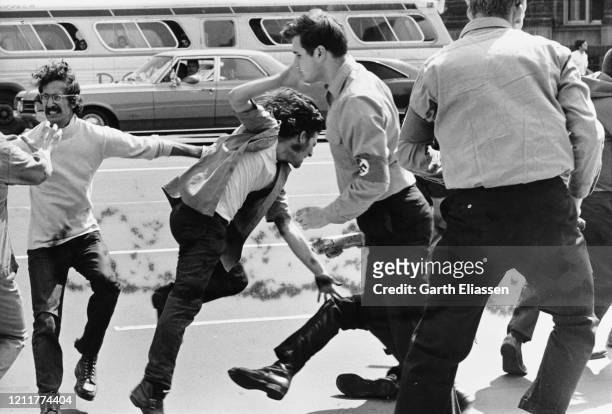 During a nationwide student strike , neo-Nazi counter-protestors fight with demonstrators on Pennsylvania Avenue, Washington DC, US, 9th May 1970.