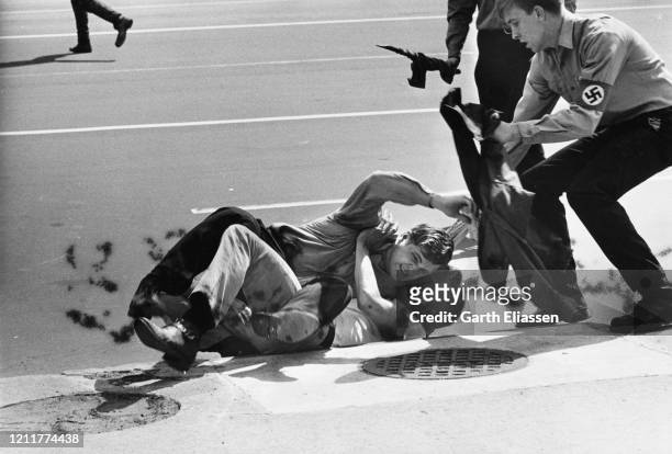 During a nationwide student strike , neo-Nazi counter-protestors fight with demonstrators on Pennsylvania Avenue, Washington DC, US, 9th May 1970.