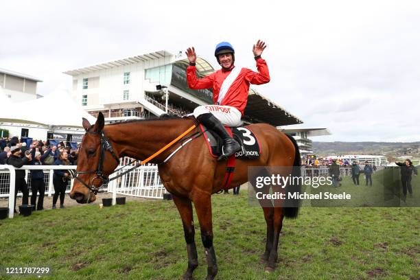 Envoi Allen ridden by Davy Russell celebrates after winning Ballymore Novices' Hurdle at Cheltenham Racecourse on March 11, 2020 in Cheltenham,...