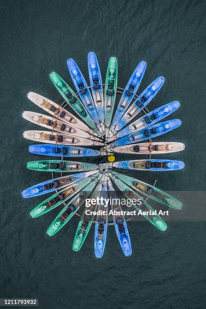 kayaks shaped like a petal - kayaking aerial stock pictures, royalty-free photos & images