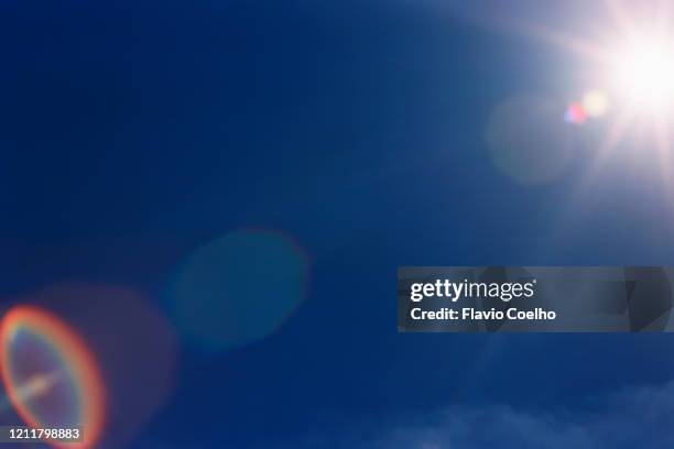 sun flare - lens optical instrument stock pictures, royalty-free photos & images