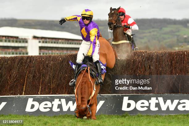 Copperhead ridden by Harry Cobden falls during the RSA Insurance Novices' Chase at Cheltenham Racecourse on March 11, 2020 in Cheltenham, England.