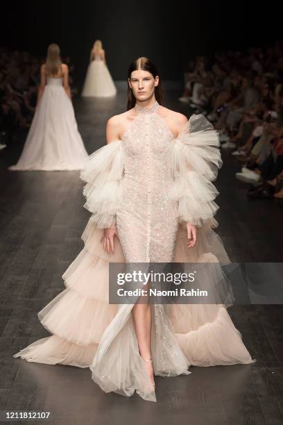 Model walks the runway in designs by Paolo Sebastian during Runway 1 at Melbourne Fashion Festival on March 11, 2020 in Melbourne, Australia.
