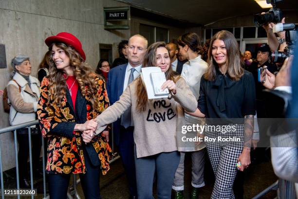 Actors Lauren Young, Jessica Mann and Dawn Dunning walk out of the courthouse after movie mogul Harvey Weinstein was sentenced to 23 years in prison...