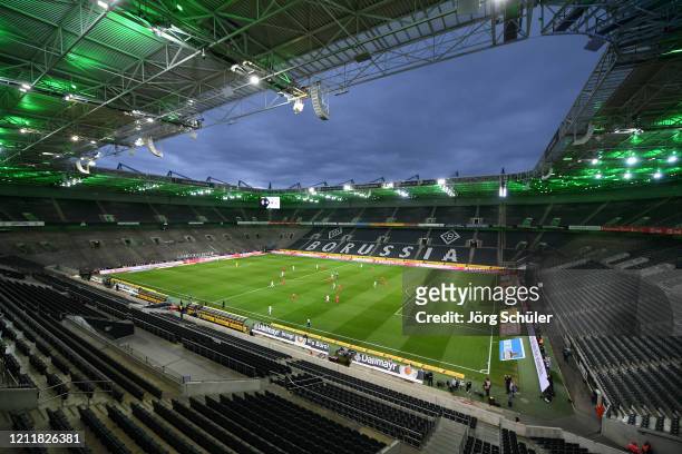 Empty seats are seen inside the stadium during the Bundesliga match between Borussia Moenchengladbach and 1. FC Koeln at Borussia-Park on March 11,...