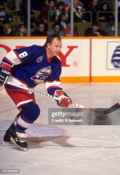 Randy Carlyle of the Winnipeg Jets skates on the ice during an NHL game circa 1992.