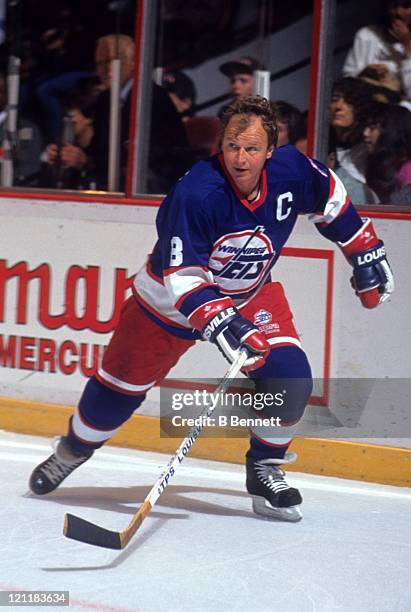 Randy Carlyle of the Winnipeg Jets skates on the ice during an NHL game against the Philadelphia Flyers circa 1990 at the Spectrum in Philadelphia,...