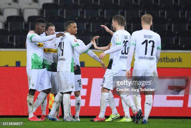 Breel Embolo of Borussia Monchengladbach celebrates his sides second goal with Alassane Plea, Stefan Lainer, Raffael and other team mates after a 1....
