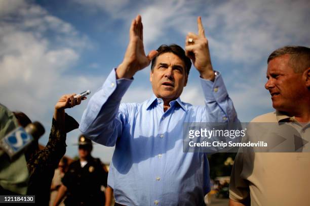 Republican presidential candidate and Texas Governor Rick Perry tells Iowa Secretary of Agriculture Bill Northey where exactly in Texas Perry grew up...