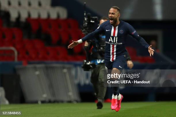 In this handout image provided by UEFA, Neymar of Paris Saint-Germain celebrates after scoring his team's first goal during the UEFA Champions League...
