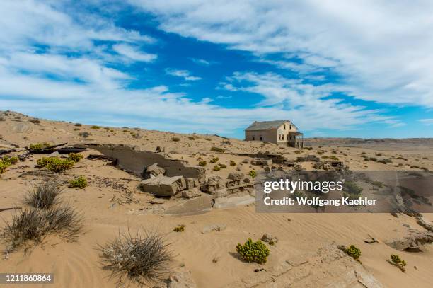 Buildings in the abandoned German diamond mining settlement of Kolmanskop near Luderitz, Namibia.