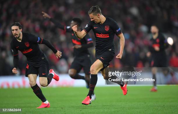 Marcos Llorente of Atletico Madrid celebrates after scoring his team's first goal during the UEFA Champions League round of 16 second leg match...