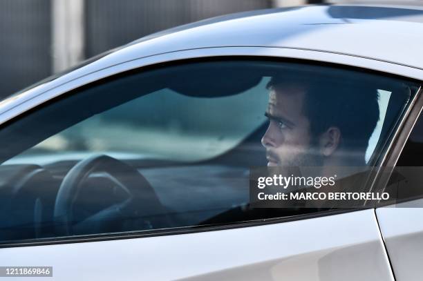 Juventus' Bosnian midfielder Miralem Pjanic arrives in his car at the Juventus' Continassa training ground in Turin on May 5 during the country's...